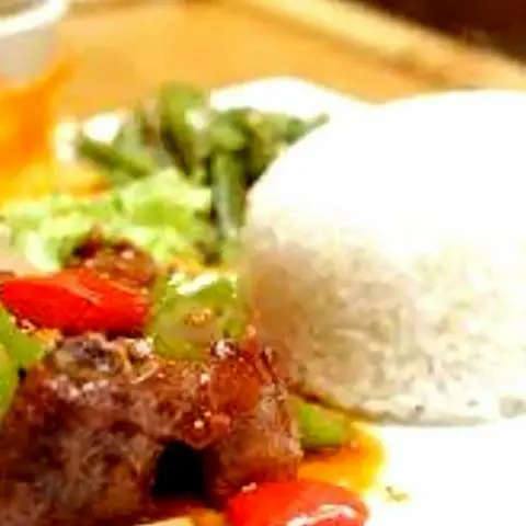 Hình ảnh Cơm chiên sườn chua ngọt