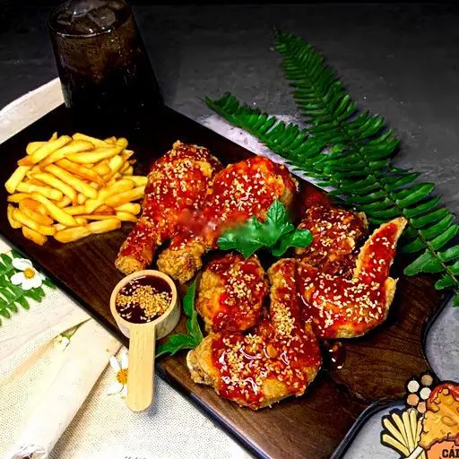 Hình ảnh Combo 3 : 4 miếng Cánh gà & 2 Đùi + Khoai/Tokbokki + Coca/Pepsi