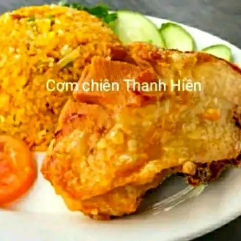 Hình ảnh Cơm má đùi gà xối mỡ - xúc xích thêm