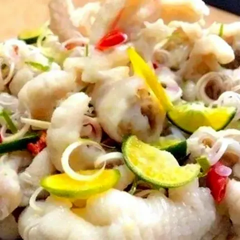 Hình ảnh Chân gà rút xương ngâm sả tắc - 500gr