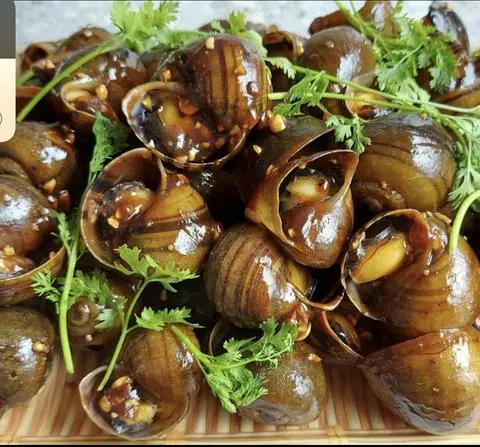 Hình ảnh ốc lác xào me 