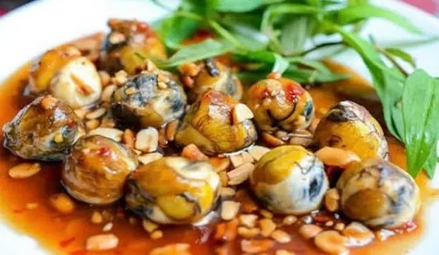 Hình ảnh Cút lộn xào me