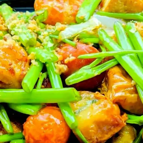 Hình ảnh Mẹt viên sốt mắm tỏi + 1 trà tắc