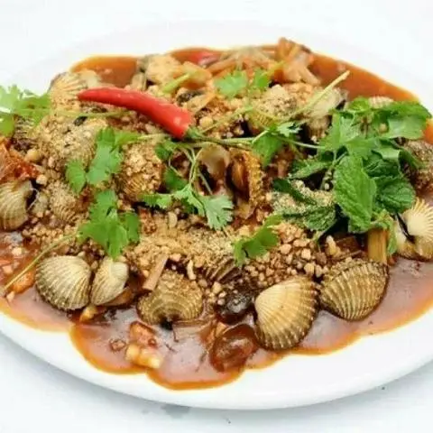 Hình ảnh Sò huyết rang me