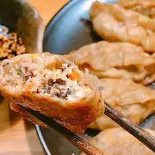 Hình ảnh Mandu chiên - trà tắc