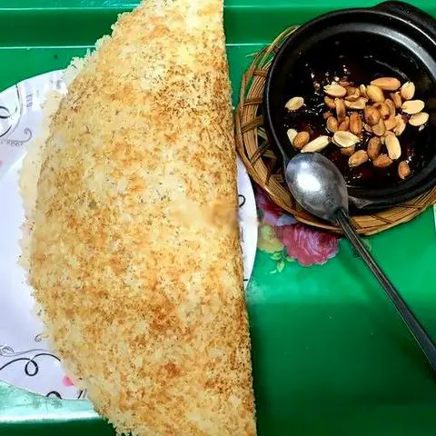 Hình ảnh Cơm cháy chay muối me đậu phộng