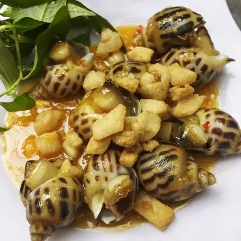 Hình ảnh Ốc hương xào