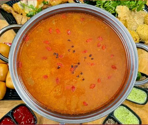 Hình ảnh Lẩu xuyên tiêu - gà ta thả vườn nguyên con gà chiên