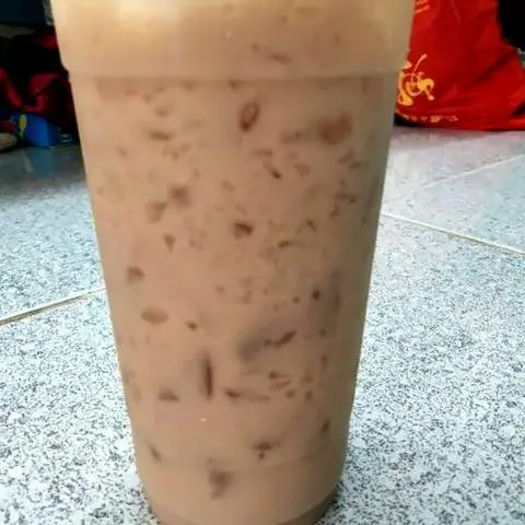 Hình ảnh Trà đào sữa - size M 650ml