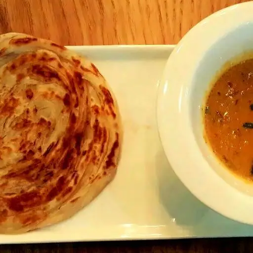 Hình ảnh Plain roti with chicken gravy