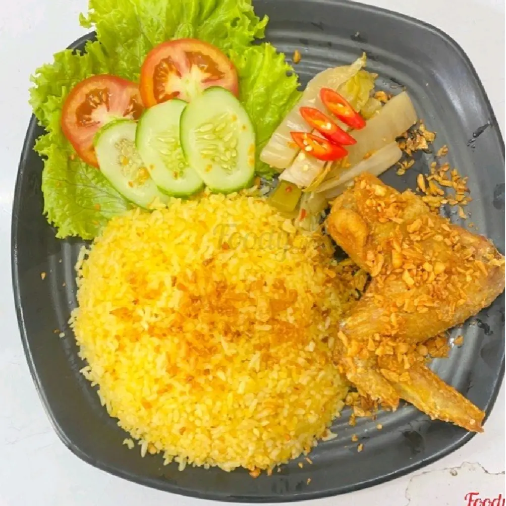 Hình ảnh Com gà sốt bơ tỏi cánh 