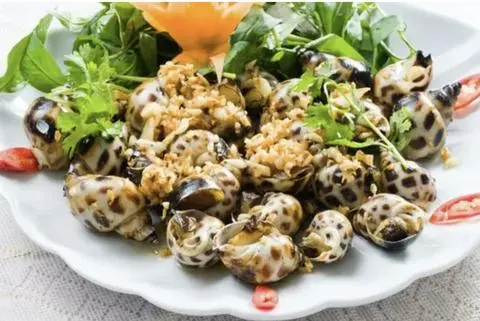 Hình ảnh ốc hương xào tỏi