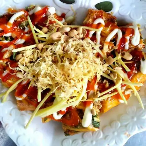 Hình ảnh Bánh tráng cuốn 4 cuốn có phủ lớp chà bông lớp xoài