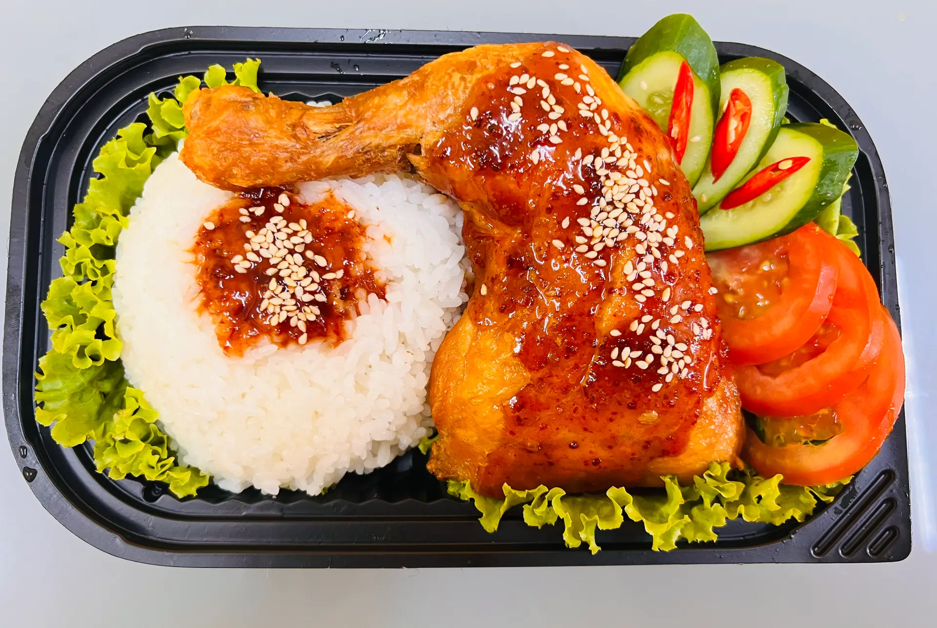 Hình ảnh Cơm gà đùi góc tư sốt 