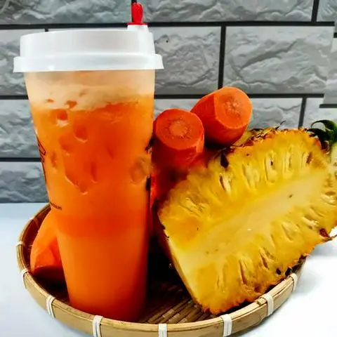 Hình ảnh Nước Ép Thơm+ Cà Rốt (Ly700ml)