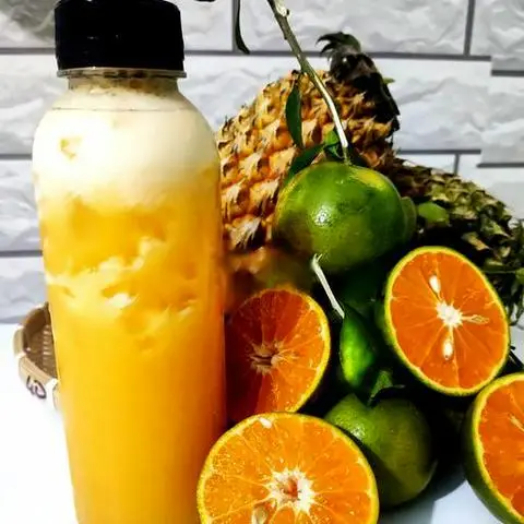 Hình ảnh Quýt Đường+ Thơm Ép (Chai330ml)