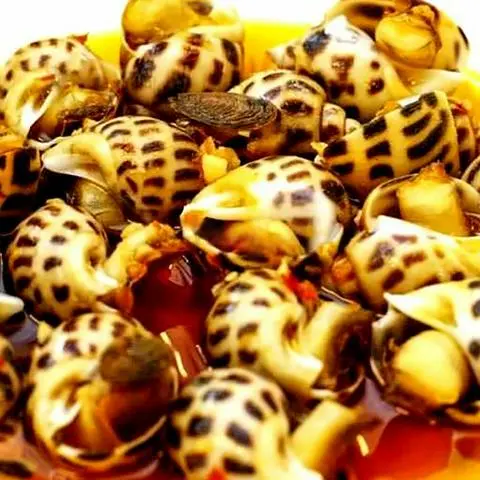 Hình ảnh Ốc hương xào bơ tỏi