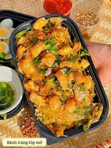 Hình ảnh phơi sương trộn tóp mỡ, ớt rim xoài