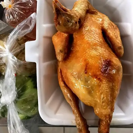 Hình ảnh Gà ta nguyên con xối mỡ
