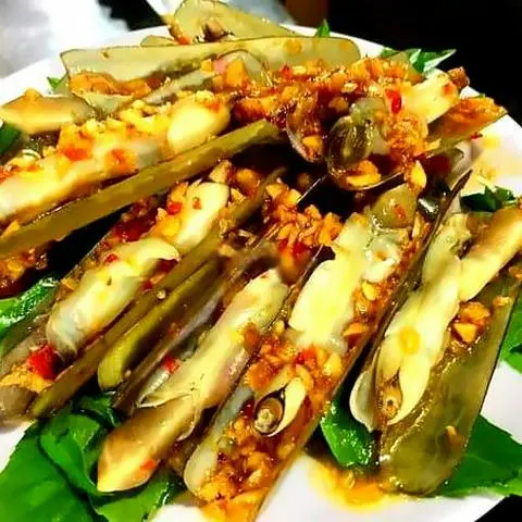 Hình ảnh Ốc móng tay cháy tỏi có bắp