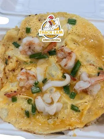 Hình ảnh Cơm Trứng Phủ ( Tôm Mực)
