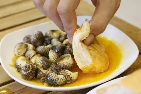 Hình ảnh ốc bông sốt trứng muối 