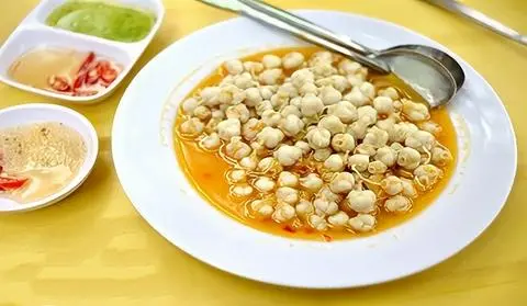 Hình ảnh Răng Mực Bơ Tỏi Bơ Cay
