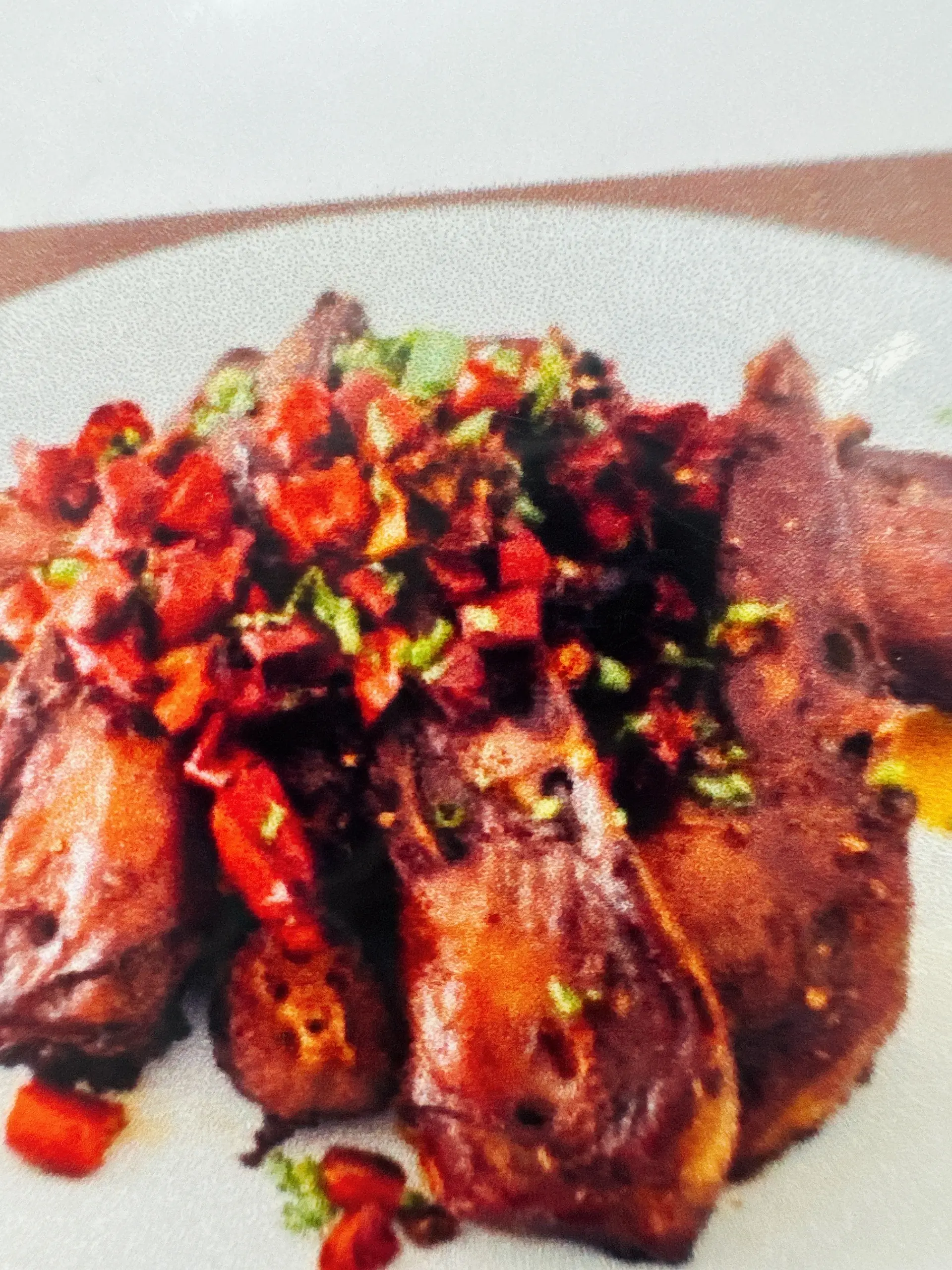 Hình ảnh Đầu vịt cay nồng - 香辣鸭头