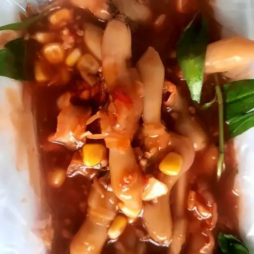 Hình ảnh Ốc móng tay xào me