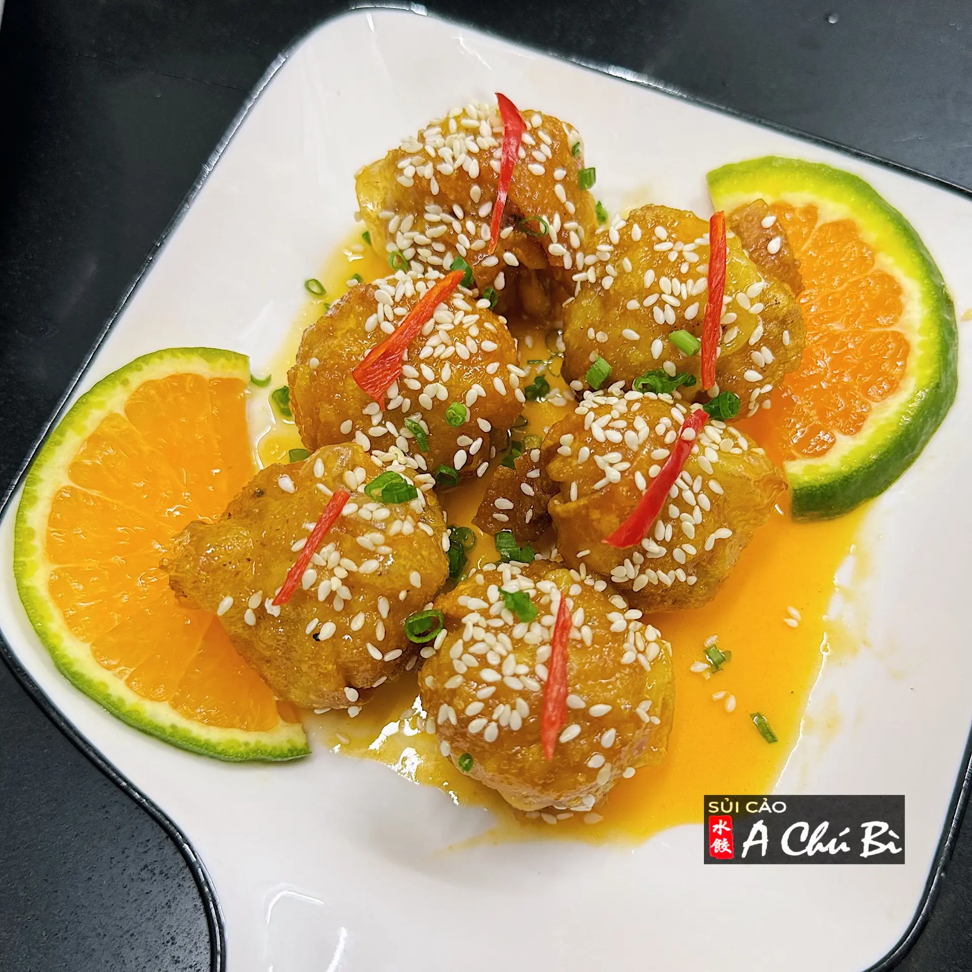 Hình ảnh HOÀNH THÁNH CHIÊN SỐT CAM (NEW)