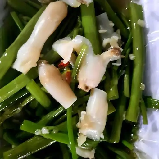 Hình ảnh Ốc móng tay xào rau muống