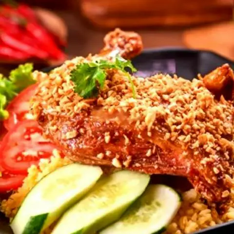 Hình ảnh Cơm đùi góc tư sốt mắm tỏi