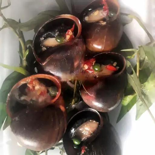 Hình ảnh Ốc bươu nướng tiêu xanh