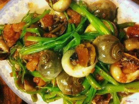 Hình ảnh ốc mỡ xào rau muống 