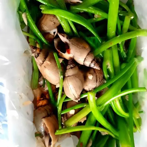 Hình ảnh Ốc cà na xào rau muống