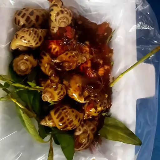 Hình ảnh Ốc hương xào me
