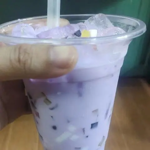 Hình ảnh trà sữa khoai môn thạch trái cây 