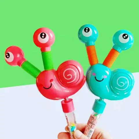Hình ảnh Cây Kẹo Ốc Sên Ngọc Kéo Dài Lò Xo Co Giãn, Kẹo Đồ Chơi Có Đèn Lắc Lư Kêu Vui Tai 2in1