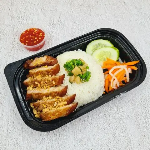 Hình ảnh Cơm Ba Rọi Rút Sườn Mắm Tỏi