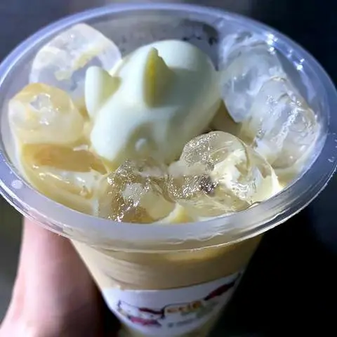 Hình ảnh Lục trà sữa khúc bạch