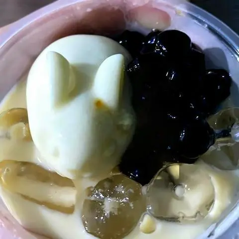Hình ảnh Lục trà sữa bánh flan trân châu