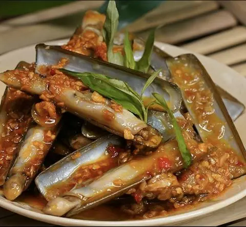 Hình ảnh ốc móng tay xào tỏi bắp