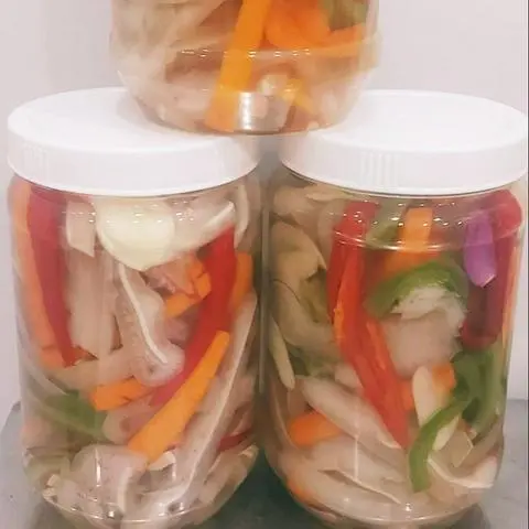 Hình ảnh Tại heo ngâm chua ngọt phần nhỏ 