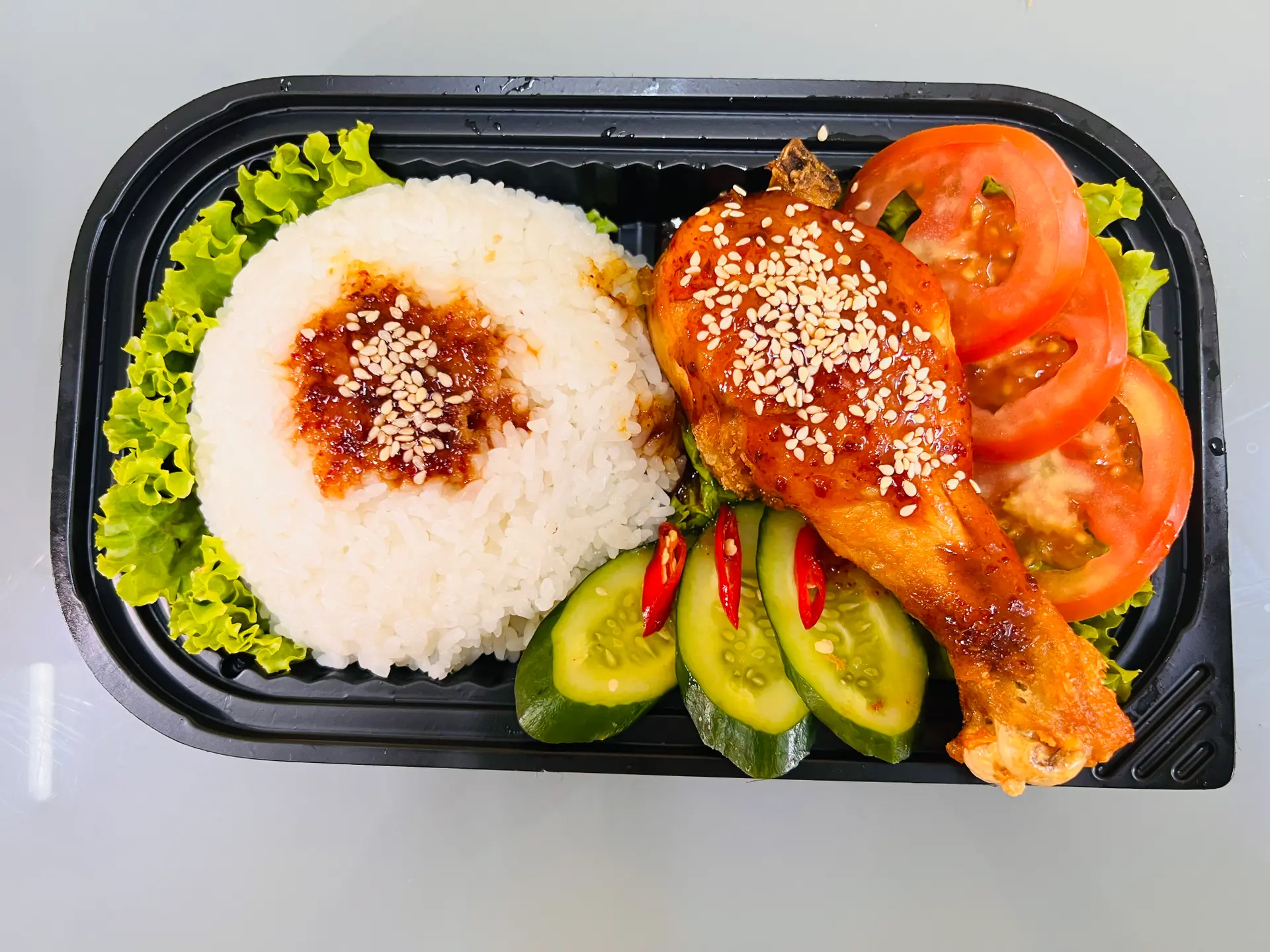 Hình ảnh Cơm đùi tỏi sốt