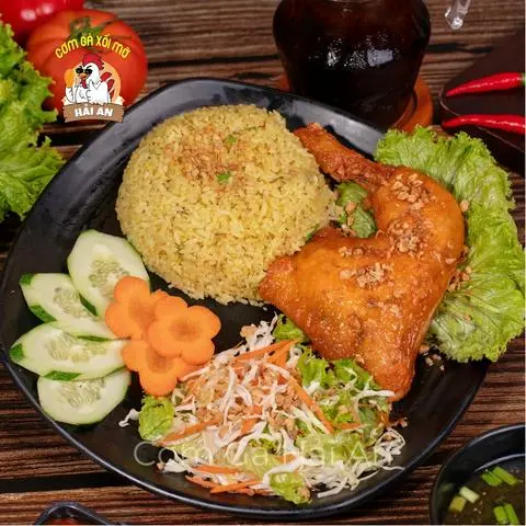 Hình ảnh Cơm Gà Góc Tư Xốt Mắm Tỏi ( đùi lớn )