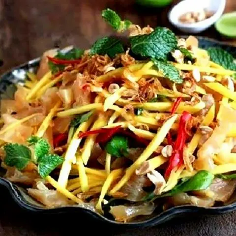 Hình ảnh Gỏi tai heo trộn xoài