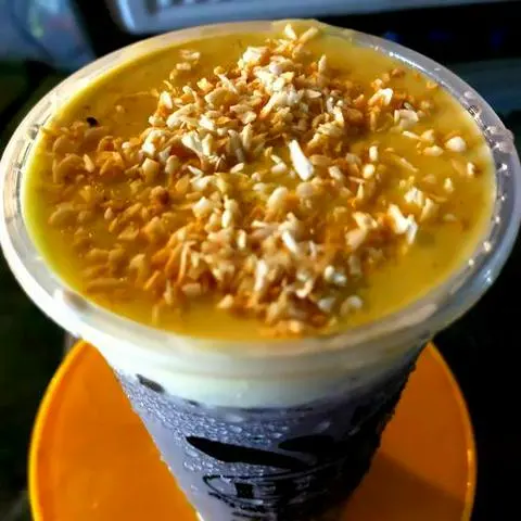 Hình ảnh Trà Sữa Than Tre Kem Trứng Dừa Nướng