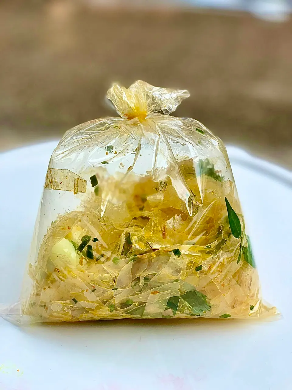 Hình ảnh Bánh tráng trộn mỡ hành (3 trứng cút) - Cay sẵn 