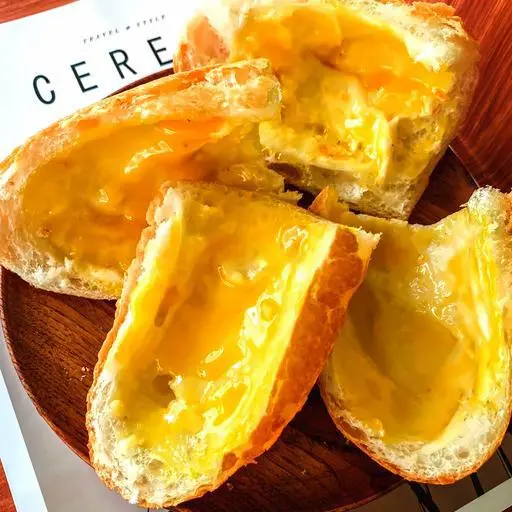 Hình ảnh ( 4 ổ ) Bánh mì nướng bơ mật ong - phần lớn 16 miếng  ( 4 ổ )