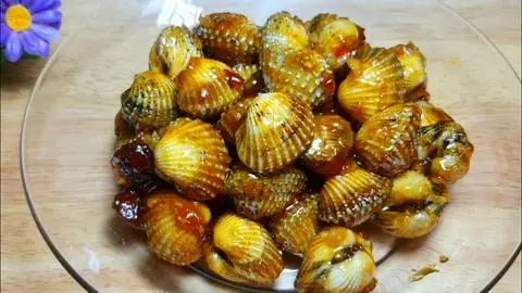 Hình ảnh Sò huyết xào me